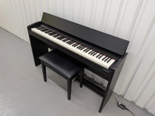Load image into Gallery viewer, Roland F140R Digital Piano in satin black slim line space saver stock # 26052