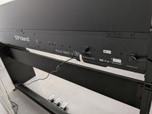 Load image into Gallery viewer, Roland F140R Digital Piano in satin black slim line space saver stock # 26052