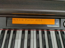 Load image into Gallery viewer, Casio Celviano AP-80R Digital Piano / arranger in rosewood stock # 26056