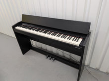 Load image into Gallery viewer, Roland F140R Digital Piano in satin black slim line space saver stock # 26060
