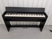 Load image into Gallery viewer, Roland F140R Digital Piano in satin black slim line space saver stock # 26060