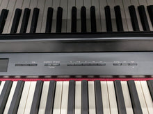 Load image into Gallery viewer, Roland HP508 digital piano and stool in polished glossy black stock number 26064