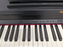 Load image into Gallery viewer, Roland RP401R digital piano and stool in satin black finish stock number 26082