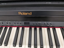 Load image into Gallery viewer, Roland RP401R digital piano and stool in satin black finish stock number 26082
