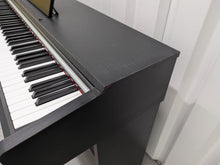Load image into Gallery viewer, Yamaha Arius YDP-142 Digital Piano in satin black stock #26081
