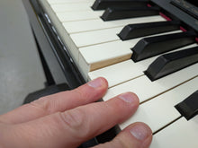 Load image into Gallery viewer, Roland HP506 Digital Piano glossy black wooden action keys + stool Stock nr 26124