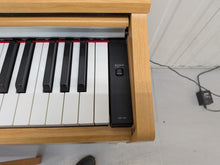 Load image into Gallery viewer, Yamaha Arius YDP-140 digital piano and stool in cherry wood finish stock #26143