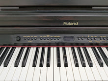 Load image into Gallery viewer, Roland HP-2e digital piano in dark rosewood finish stock number 26140