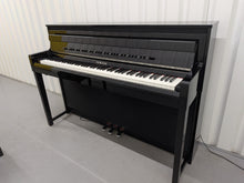 Load image into Gallery viewer, Yamaha Clavinova CLP-585 digital piano and stool in glossy black stock #26208