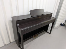 Load image into Gallery viewer, Yamaha Clavinova CLP-535 digital piano in dark rosewood stock #26216