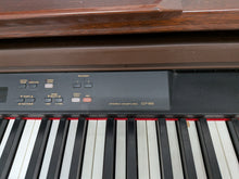 Load image into Gallery viewer, Yamaha Clavinova CLP-860 Digital Piano and stool in mahogany stock # 26231
