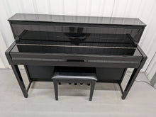 Load image into Gallery viewer, Yamaha Clavinova CLP-585 digital piano and stool in glossy black stock #26255