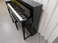 Load image into Gallery viewer, Yamaha Clavinova CLP-585 digital piano and stool in glossy black stock #26255