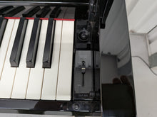 Load image into Gallery viewer, Yamaha Clavinova CLP-585 digital piano and stool in glossy black stock #26255