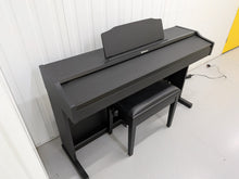 Load image into Gallery viewer, Roland RP102 digital piano and stool in satin black finish stock number 26290