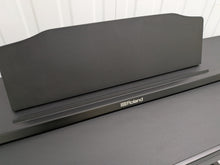 Load image into Gallery viewer, Roland RP102 digital piano and stool in satin black finish stock number 26290