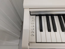 Load image into Gallery viewer, Yamaha Arius YDP-144 digital piano and stool in satin white stock nr 26287