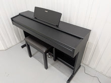 Load image into Gallery viewer, Yamaha Arius YDP-144 digital piano and stool in satin black stock #26303