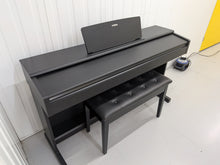 Load image into Gallery viewer, Yamaha Arius YDP-144 digital piano and stool in satin black stock #26286
