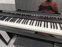 Load image into Gallery viewer, Yamaha Clavinova CLP-525PE digital piano and stool in glossy black ebony stock # 26298