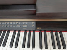 Load image into Gallery viewer, Yamaha Clavinova CLP-150 digital piano and stool in rosewood stock #26302