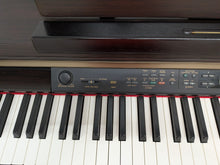 Load image into Gallery viewer, Yamaha Clavinova CLP-150 digital piano and stool in rosewood stock #26302