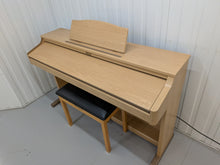 Load image into Gallery viewer, Roland HP-2e digital piano and stool in light oak finish stock number 26312