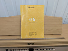 Load image into Gallery viewer, Roland HP-2e digital piano and stool in light oak finish stock number 26312