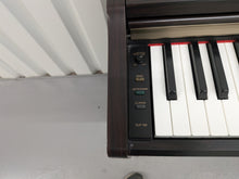 Load image into Gallery viewer, Yamaha Clavinova CLP-110 Digital Piano in dark rosewood stock #26314