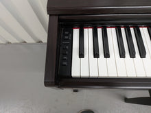 Load image into Gallery viewer, Yamaha Arius YDP-144 digital piano and stool in rosewood stock #26360