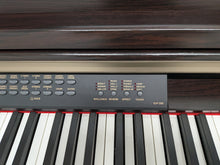 Load image into Gallery viewer, Yamaha Clavinova CLP-230 digital piano and stool in dark rosewood stock #26407