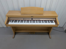 Load image into Gallery viewer, Roland HP-2e digital piano in light oak finish stock number 26393