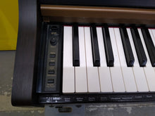 Load image into Gallery viewer, Roland HP101e Digital Piano Full Size 88 weighte keys 3 pedals, stock nr 22033