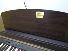 Load image into Gallery viewer, Yamaha Clavinova CLP-920 Digital Piano in rosewood, weighted keys stock nr 22041