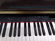 Load image into Gallery viewer, Yamaha Clavinova CLP-330 Digital Piano in rosewood with stool stock nr 22083