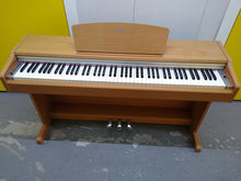Load image into Gallery viewer, Yamaha Arius YDP-131 Digital Piano in ligght oak finish stock nr 22091