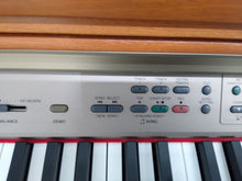 Load image into Gallery viewer, Yamaha Clavinova CLP-150c Digital Piano with stool in light oak stock nr 22113