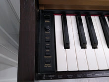 Load image into Gallery viewer, Roland HP101e Digital Piano with stool weighted keys 3 pedals, stock # 22127