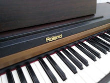 Load image into Gallery viewer, Roland HP101e Digital Piano with stool weighted keys 3 pedals, stock # 22127
