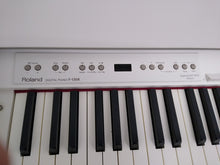Load image into Gallery viewer, Roland F130R Digital Piano in white with matching colour stool stock # 22136