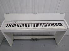Load image into Gallery viewer, Roland F130R Digital Piano in white with matching colour stool stock # 22136