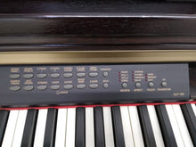 Load image into Gallery viewer, Yamaha Clavinova CLP-130 Digital Piano and stool in rosewood stock number 22121