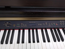 Load image into Gallery viewer, Yamaha Clavinova CLP-130 Digital Piano and stool in rosewood stock number 22327