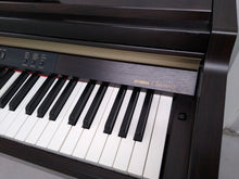 Load image into Gallery viewer, YAMAHA CLAVINOVA CLP-930 Digital Piano in rosewood, weighted keys, comes with stool.  stock nr 22131