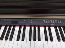 Load image into Gallery viewer, YAMAHA CLAVINOVA CLP-930 Digital Piano in rosewood, weighted keys, comes with stool.  stock nr 22131