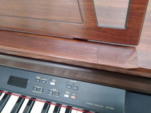 Load image into Gallery viewer, Yamaha Clavinova CLP-860 Digital Piano and stool in mahogany stock # 22143