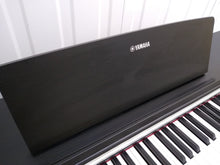Load image into Gallery viewer, Yamaha Arius YDP-142B Digital Piano in black weighted keys stock number 22155