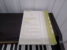 Load image into Gallery viewer, Yamaha Clavinova CLP-115 Digital Piano abd stool in rosewood stock no 22159