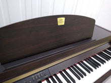 Load image into Gallery viewer, Yamaha Clavinova CLP-920 Digital Piano in rosewood, weighted keys stock nr 22170