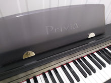 Load image into Gallery viewer, Casio Privia PX-730 Compact slimline Digital Piano Full size . Stock no 22175